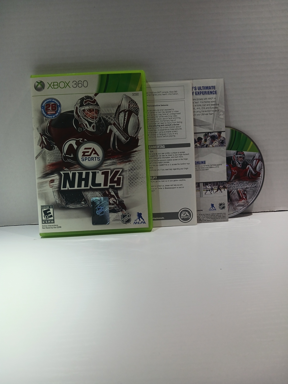 EA Sports NHL Xbox 360 Game with Bright Green Case and Disc